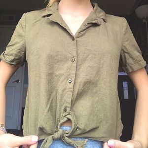 green button-up crop top. collared.